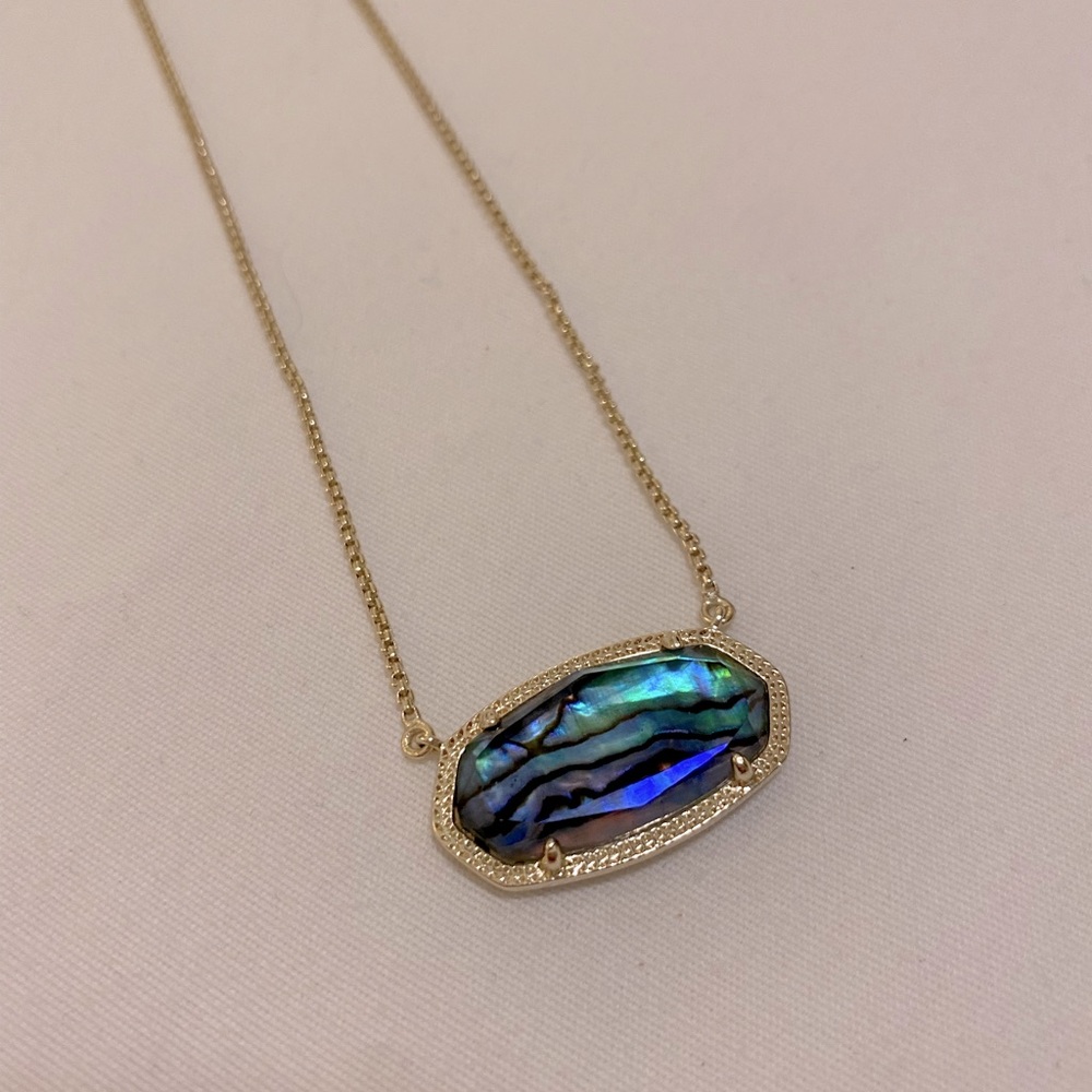 Kendra Scott gold necklace in abalone